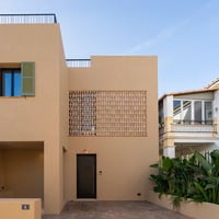 Modern apartment featuring a balcony, sea view, pool, and sleek design. Natural lighting, neutral colors, and high-quality materials.