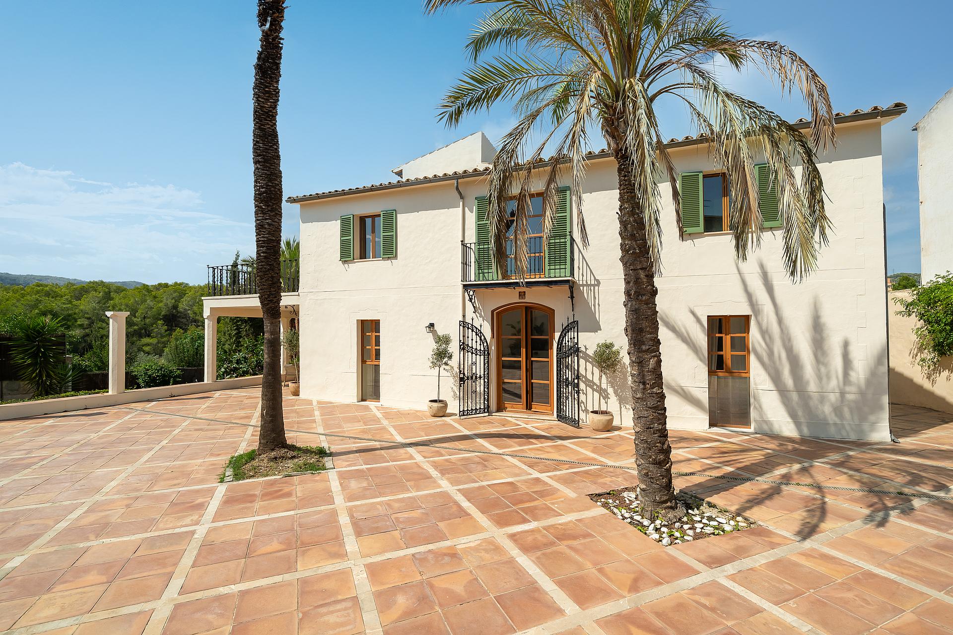 Stunning villa facade with pool