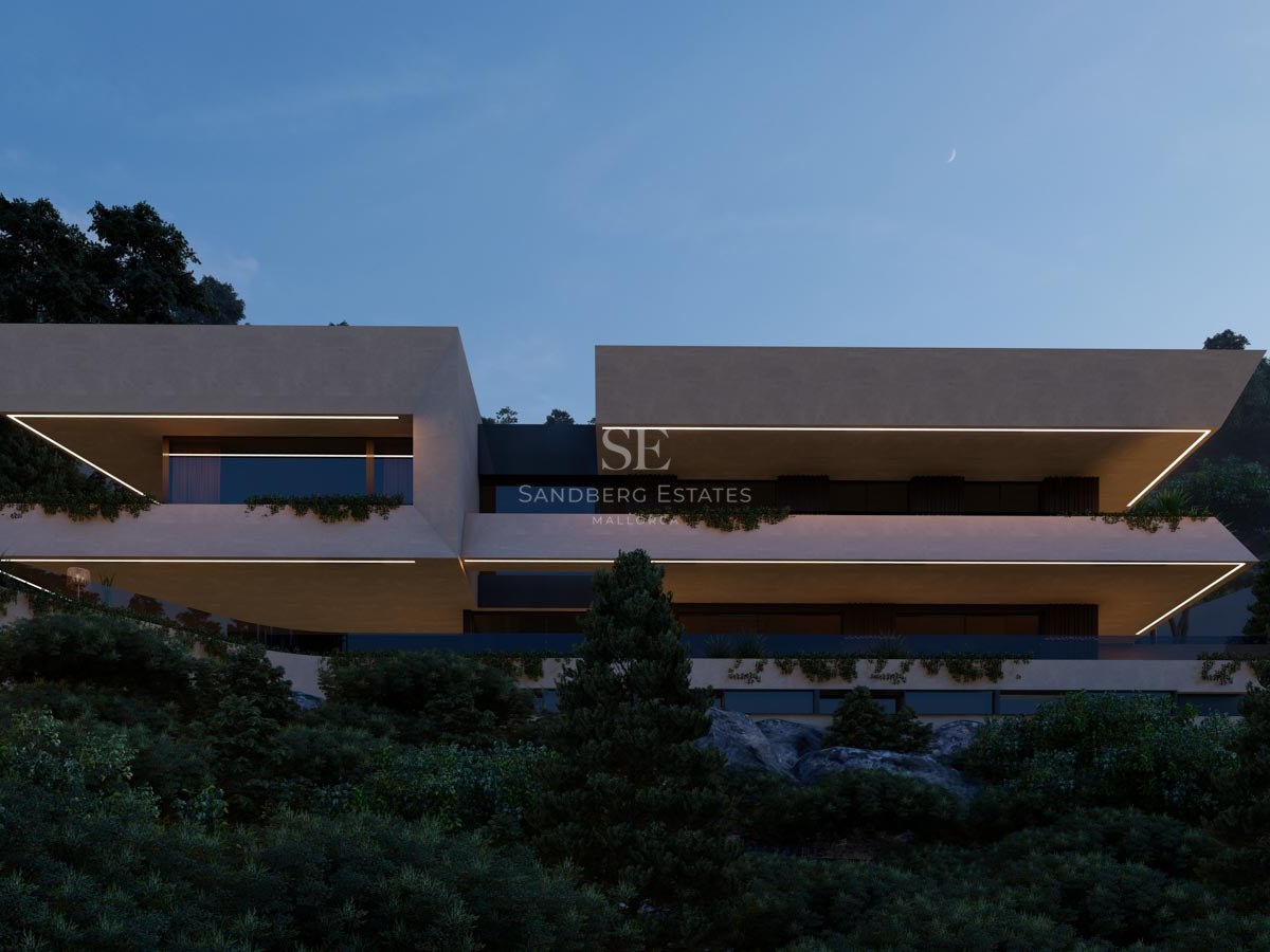 Vista nocturna de una villa moderna de varios niveles con terrazas voladas e iluminación LED perimetral.