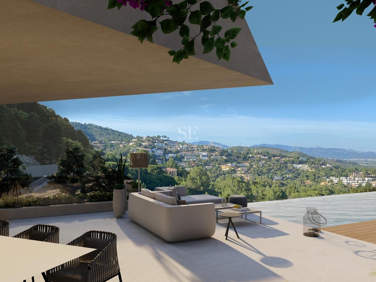 Terraza de villa contemporánea con zona lounge, piscina infinity y vistas despejadas a las montañas.