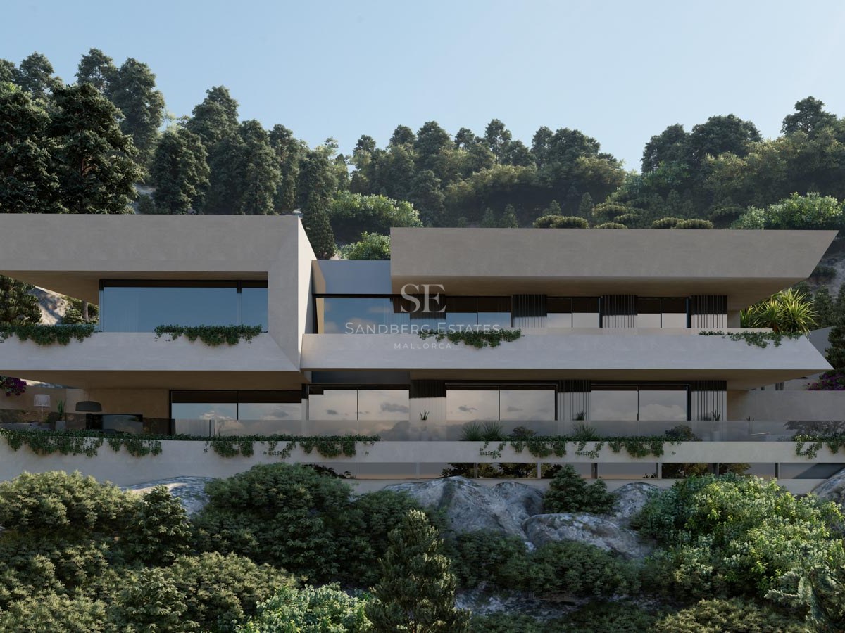 Moderna villa de dos niveles con estructuras blancas voladizas, barandillas de cristal y vegetación en una ladera boscosa.