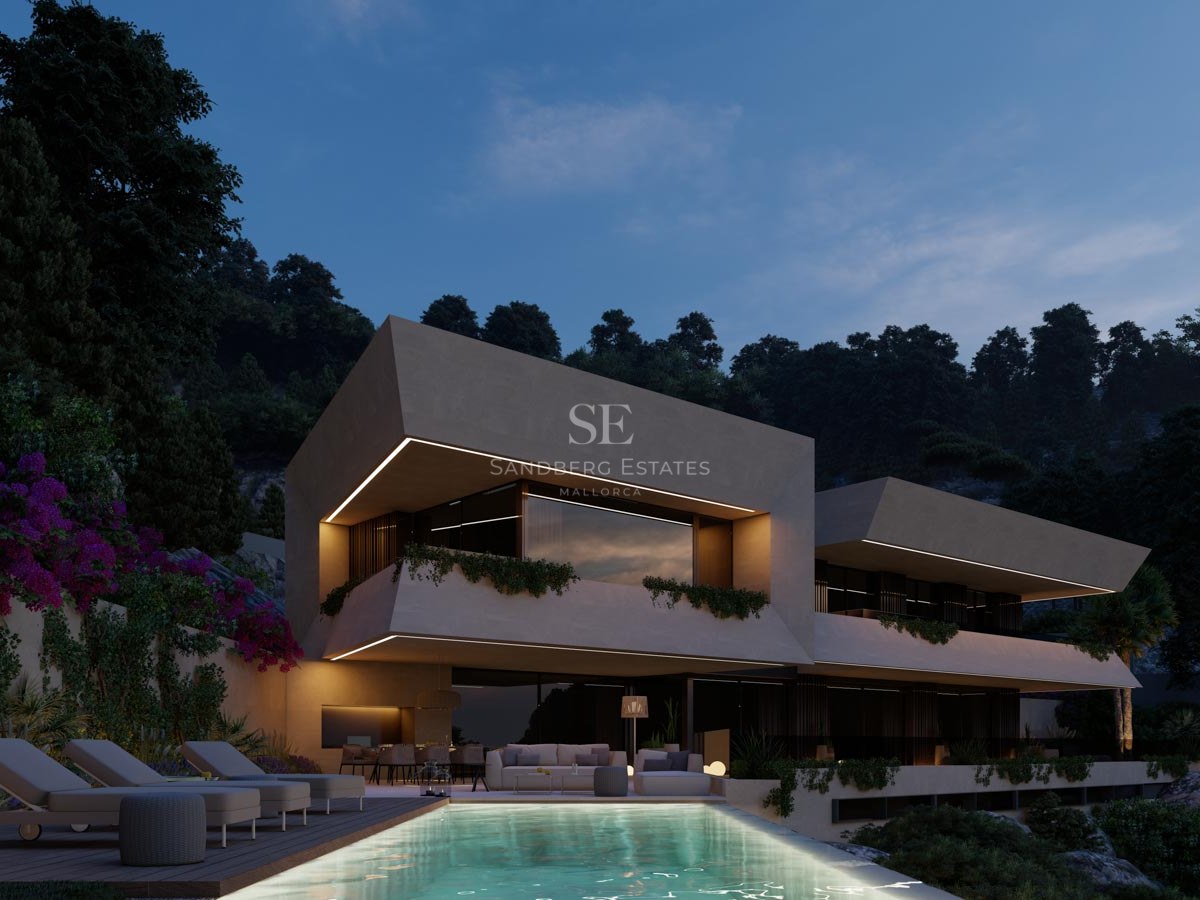 Vista nocturna de una villa contemporánea con piscina infinita, líneas geométricas e iluminación cálida integrada.