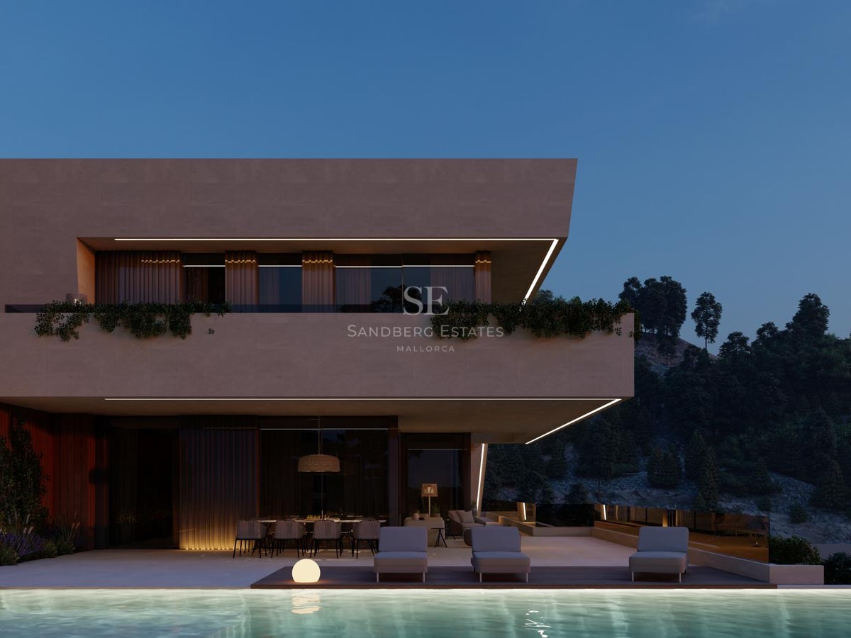 Modern villa med infinitypool, utomhusmatplats och integrerad LED-belysning mot en mörkblå kvällshimmel.