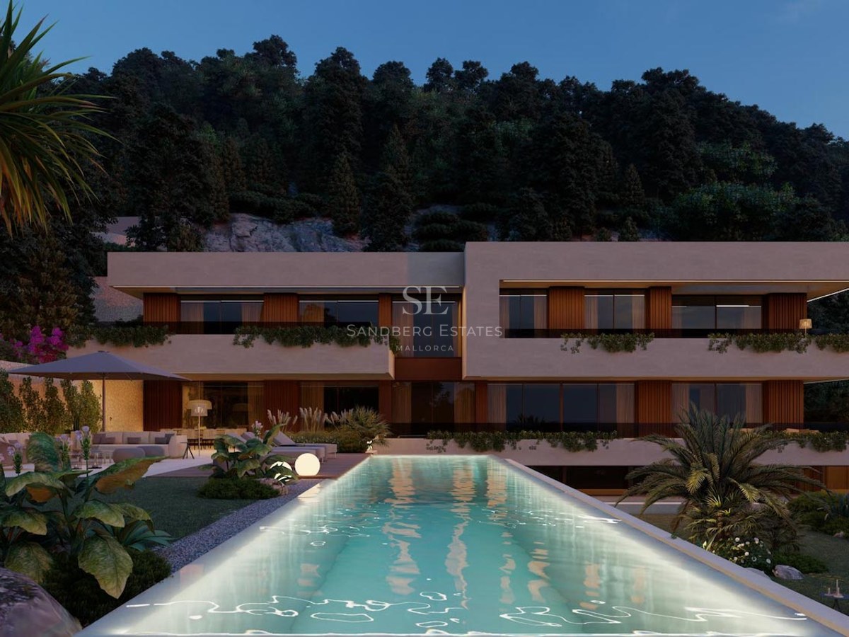 Kvällsvy av en samtida villa med belyst infinitypool och lummig bergsbakgrund.