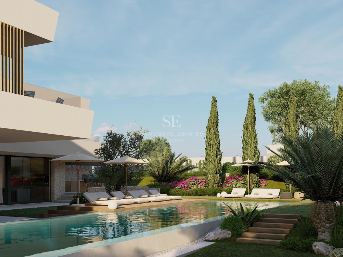 Large turquoise swimming pool with wooden decking, sun loungers, and palm trees in front of a modern white villa.
