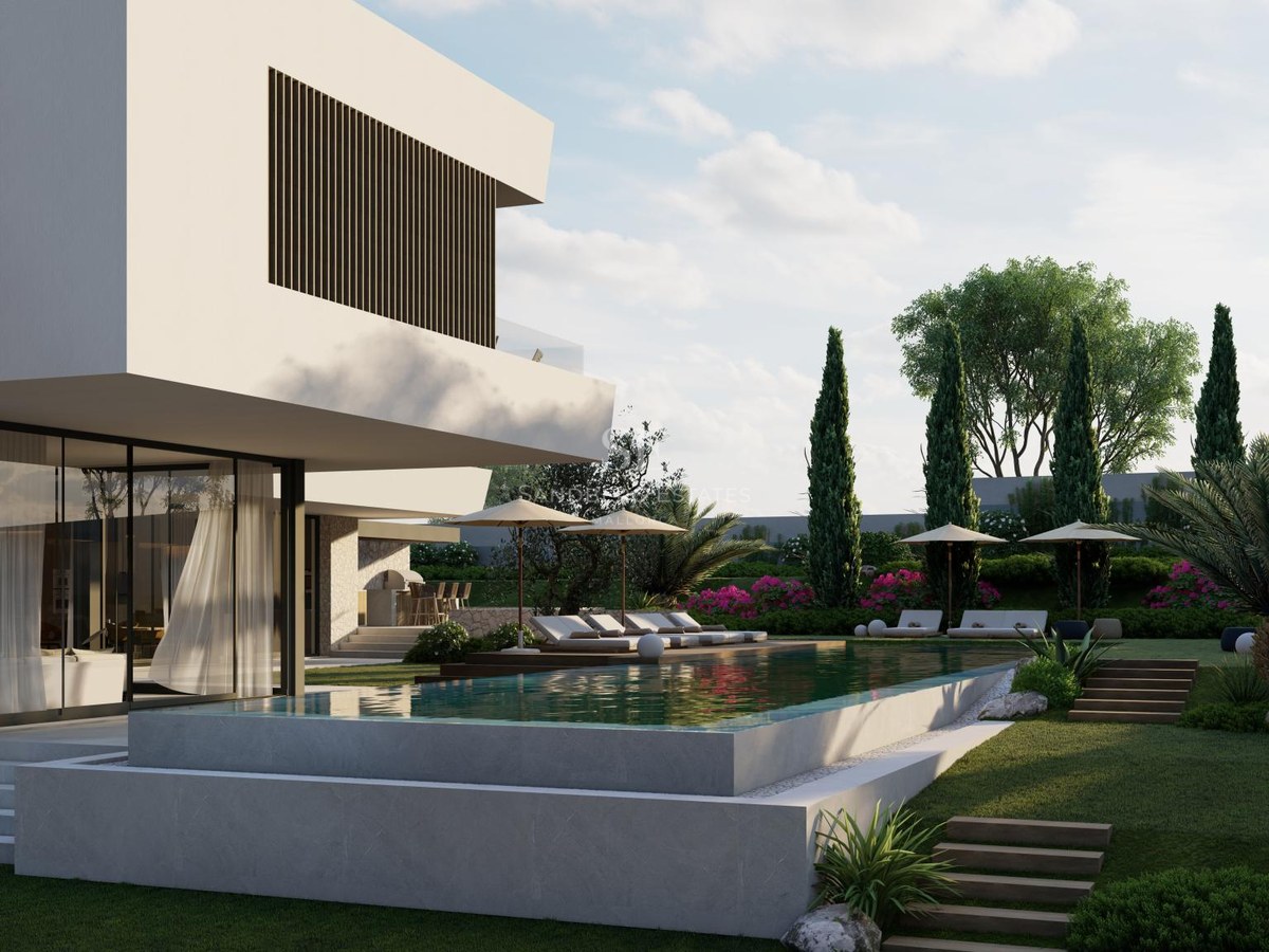 Contemporary two-story villa with an infinity swimming pool, glass walls, and lush Mediterranean gardens.