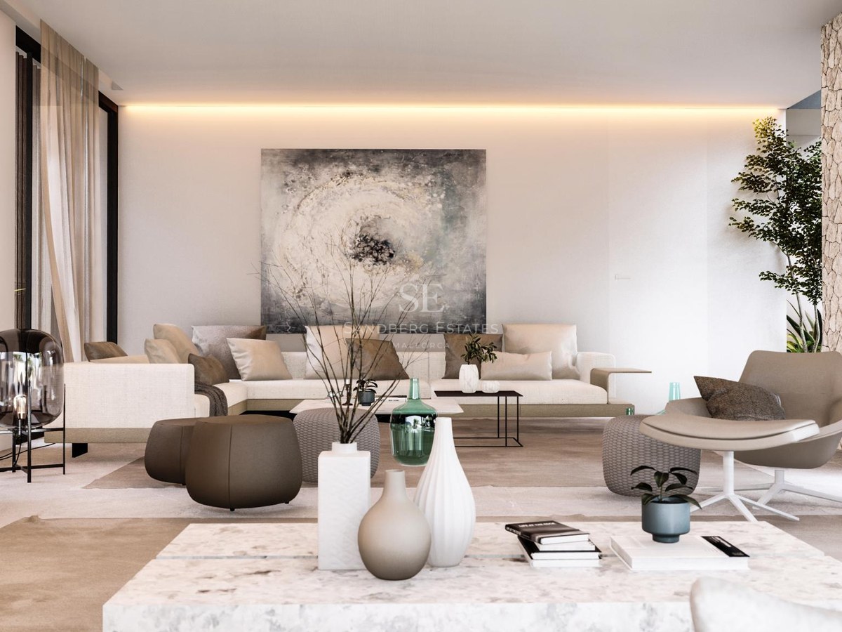Spacious modern living room featuring a natural stone wall, large white L-shaped sofa, marble tables, and sheer curtains.