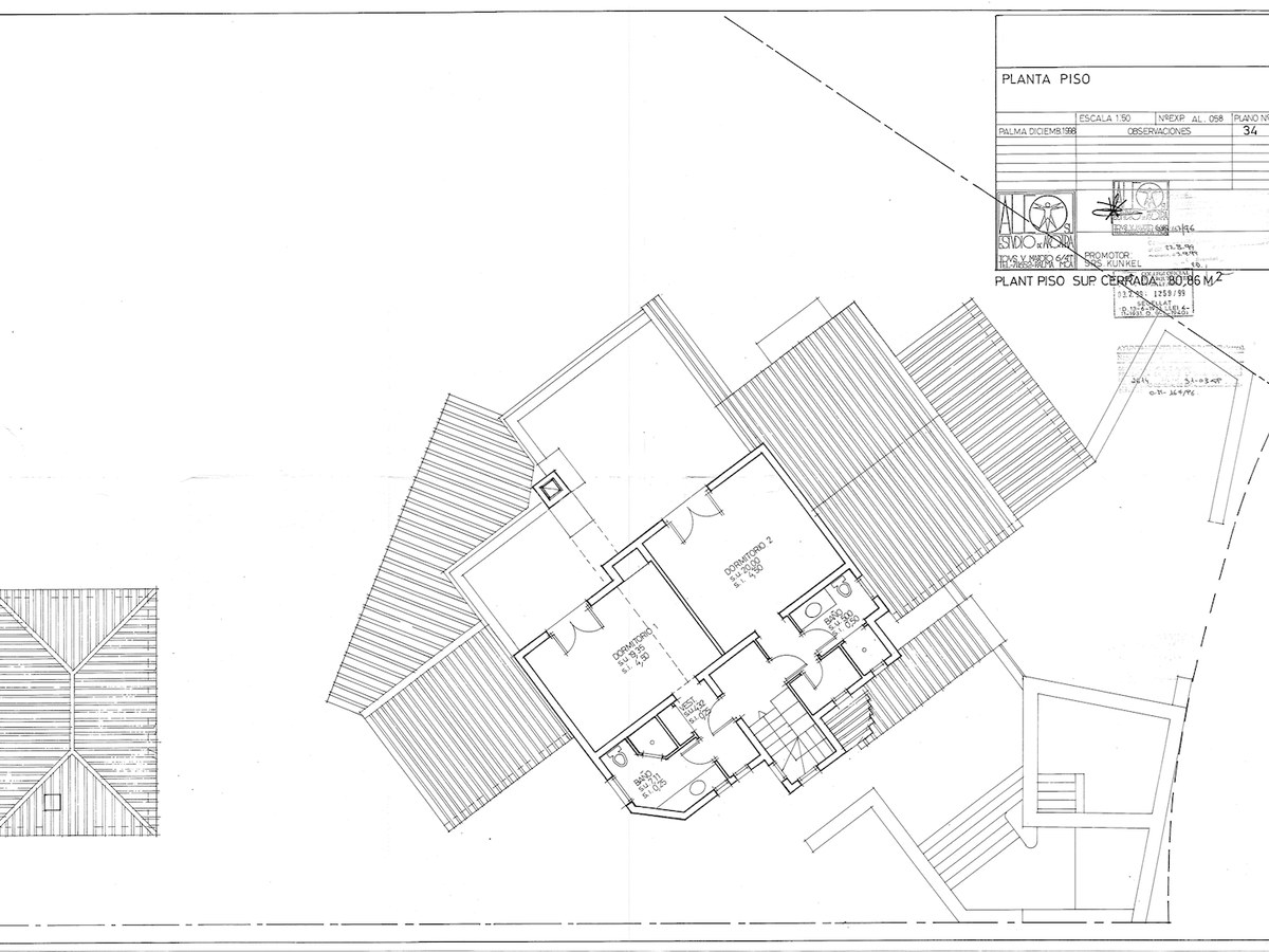 Technical floor plan showing the layout of two bedrooms, two bathrooms, and terrace area on the upper floor.