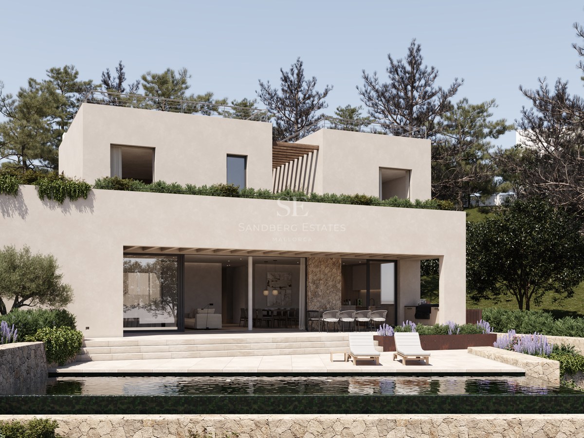 Villa moderne beige à deux étages avec piscine à débordement, murs en pierre et transats sous un ciel bleu.