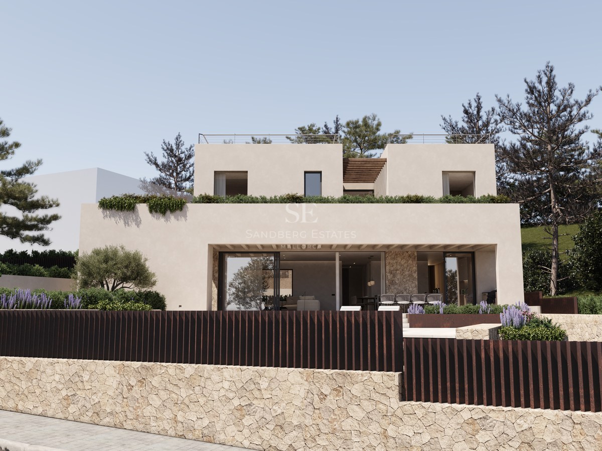 Façade d'une villa moderne de deux étages avec murs en pierre, grandes baies vitrées et pins méditerranéens.