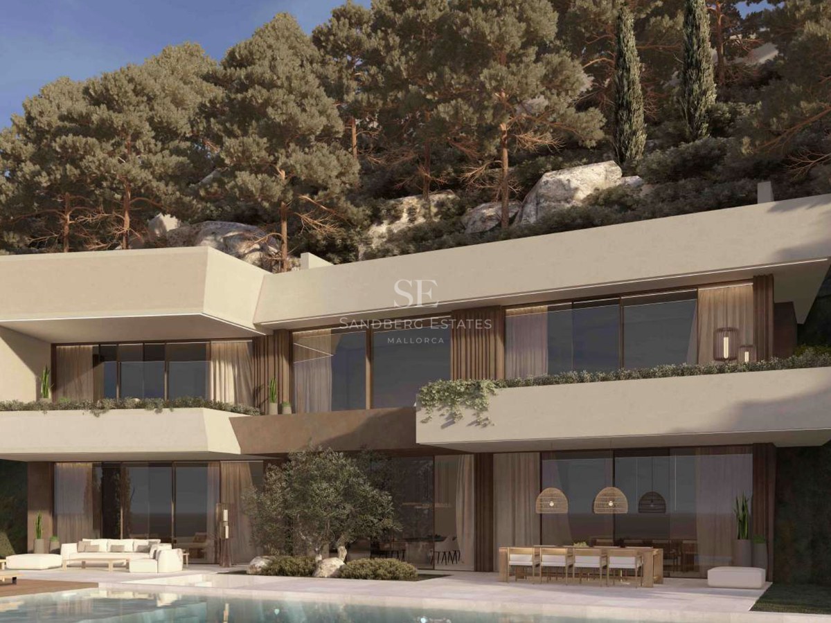 Moderna villa de dos plantas con fachada blanca, grandes ventanales, zona de comedor exterior y piscina al atardecer.