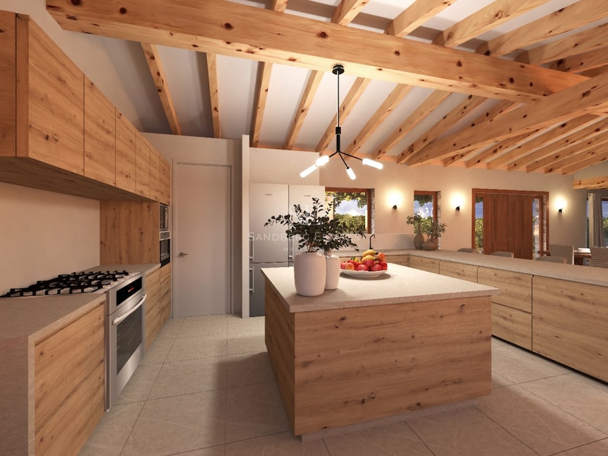Spacious kitchen featuring exposed wood beams, light oak cabinetry, and a large central island.