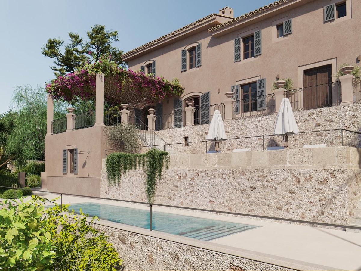 Villa en pierre avec piscine, terrasses à plusieurs niveaux et pergola de bougainvilliers sous un ciel bleu.