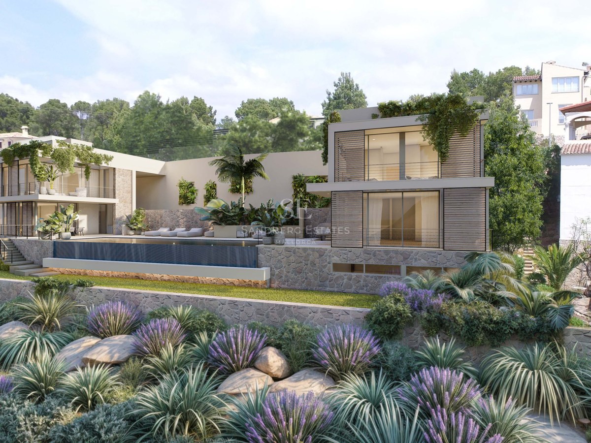 Villa moderne sur deux niveaux avec murs en pierre, grandes baies vitrées et piscine à débordement.