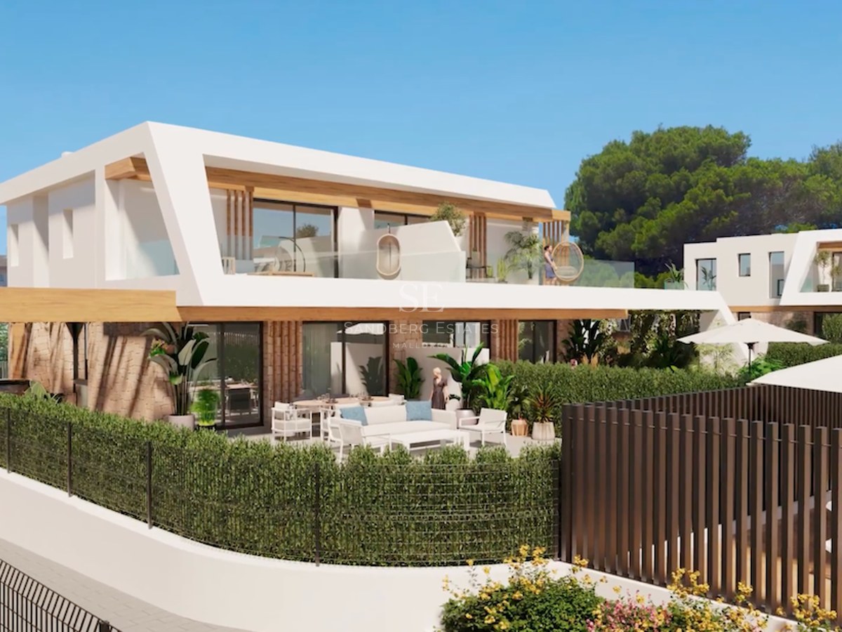 Modern two-story villa featuring white architecture, natural stone walls, large terraces, and a landscaped garden.