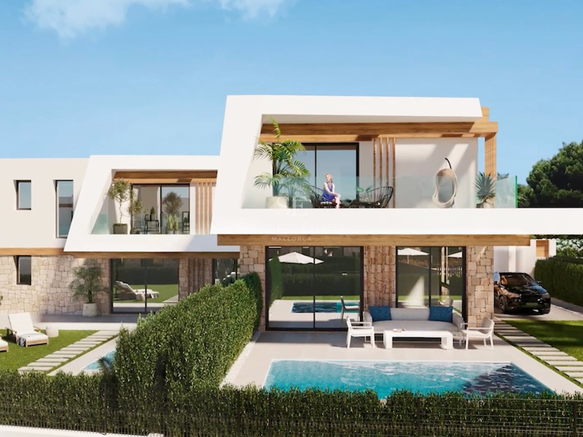 Two-story white modern villa with natural stone, a pool, and manicured lawn under a clear blue sky.