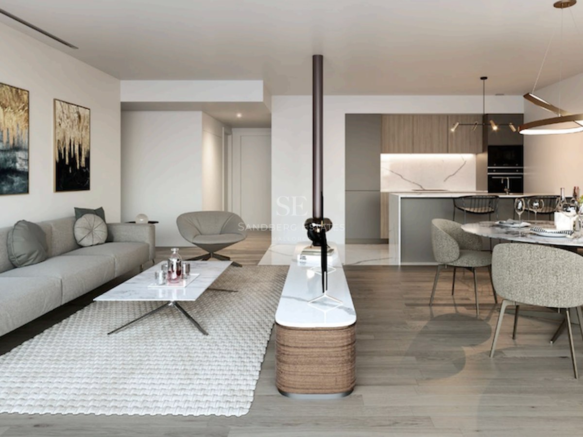 Modern open-plan living room with grey sofa, marble coffee table, and dining area with a view of a minimalist kitchen.