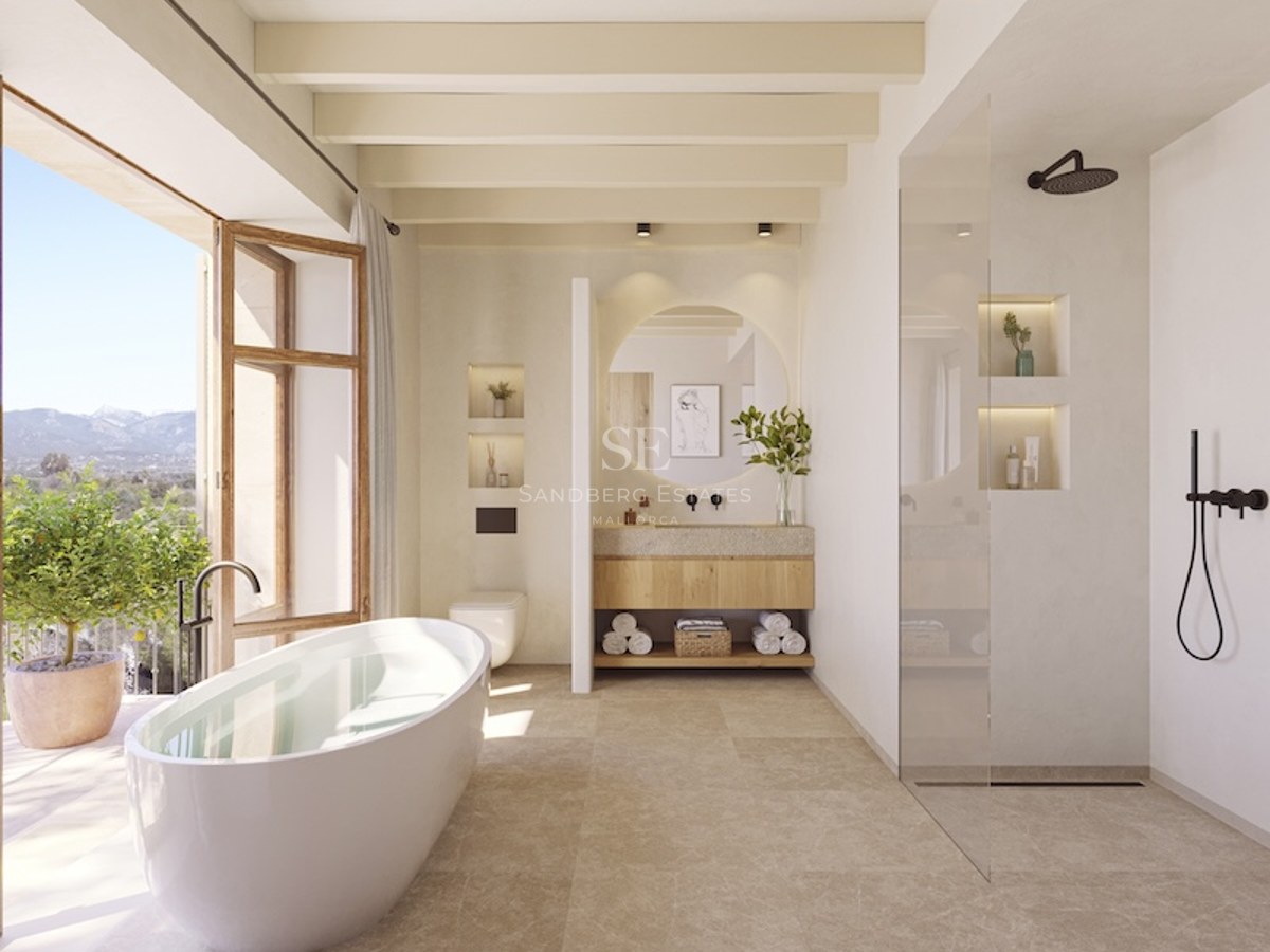 Modern bathroom featuring a freestanding tub next to a balcony, wooden ceiling beams, and a walk-in shower.