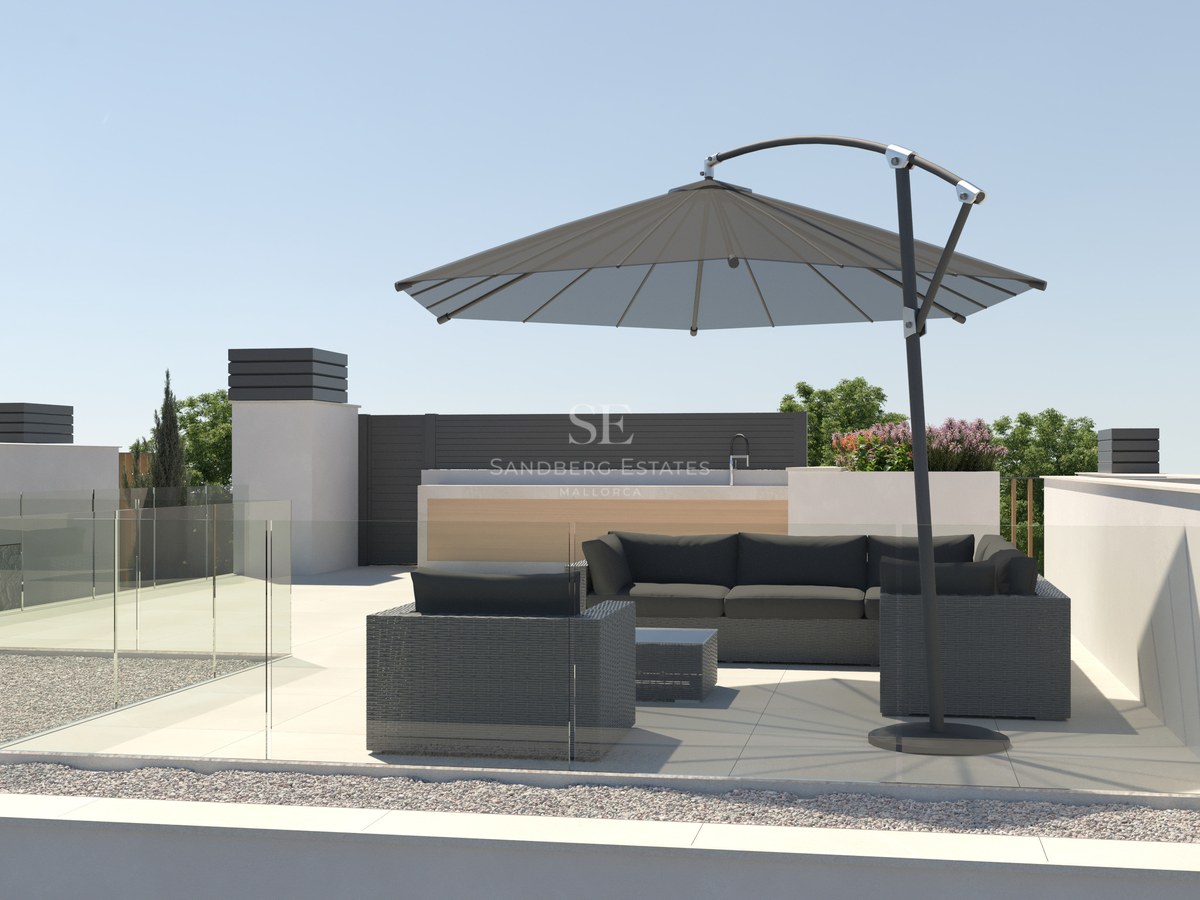Terrasse sur le toit avec canapés gris anthracite, grand parasol déporté et garde-corps en verre.