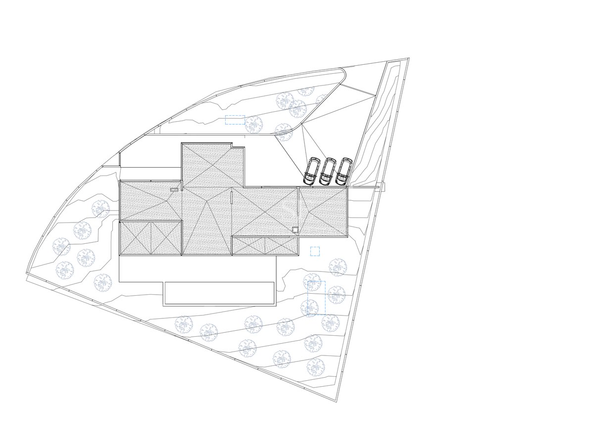 Plan technique en noir et blanc montrant l'implantation du bâtiment, le parking et les espaces paysagers.