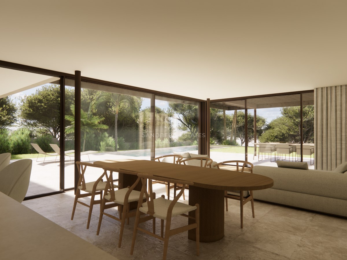 Salon et salle à manger modernes avec de grandes baies vitrées ouvrant sur une terrasse, une piscine et un jardin.