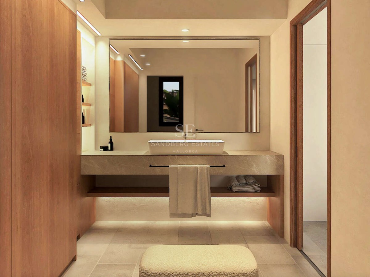 Meuble vasque moderne avec plan de travail en pierre flottant, vasque à poser et menuiserie en bois chaleureux.