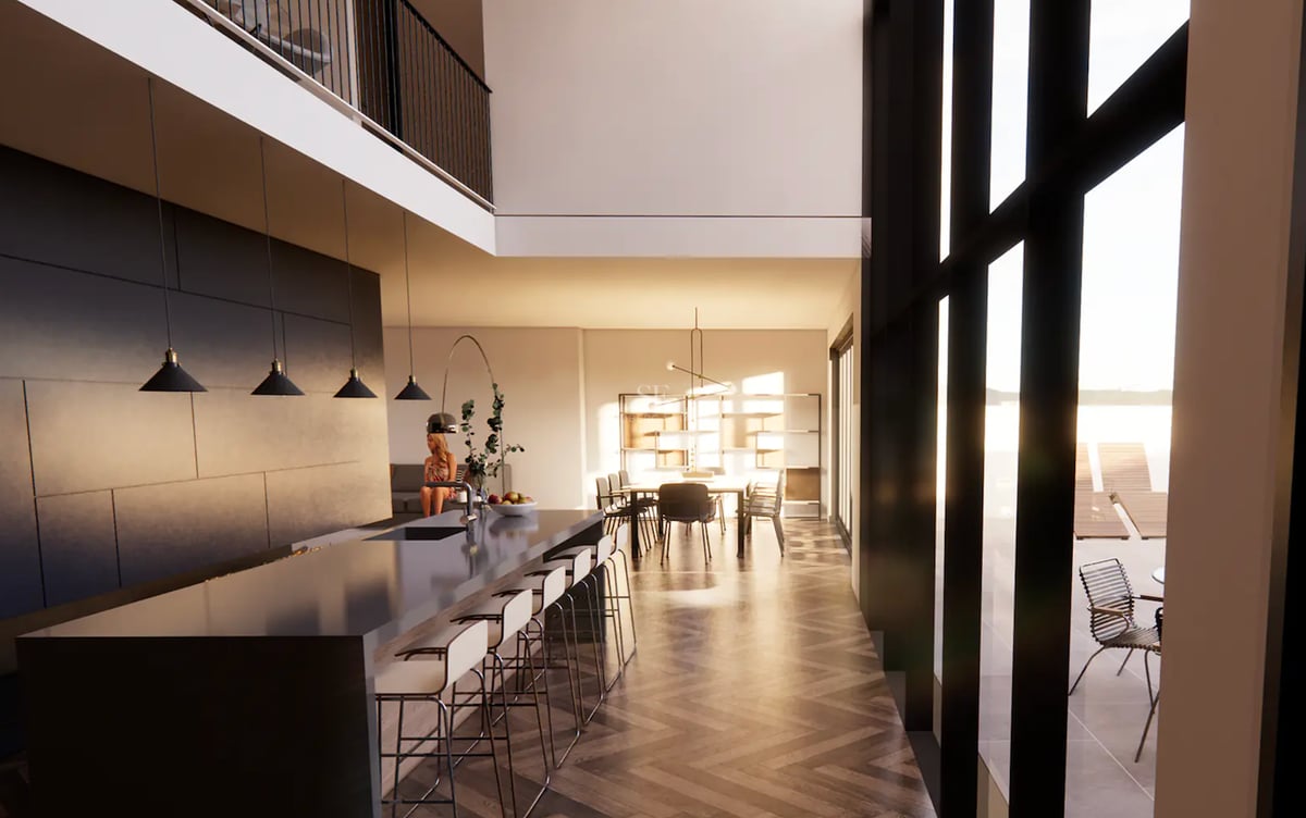 Cuisine moderne avec îlot, parquet en point de Hongrie et plafond double hauteur avec grandes baies vitrées.