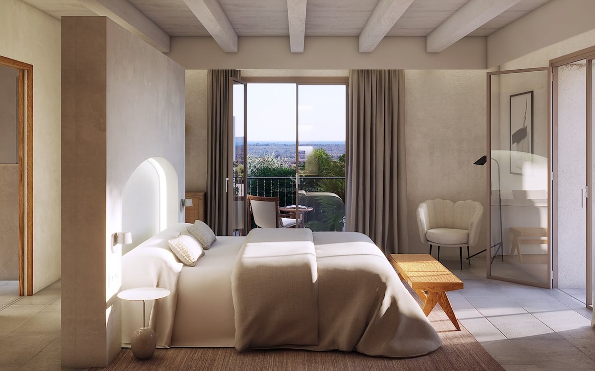 Dormitorio principal de diseño mediterráneo moderno con vigas de madera, terraza privada y paleta de colores neutros.