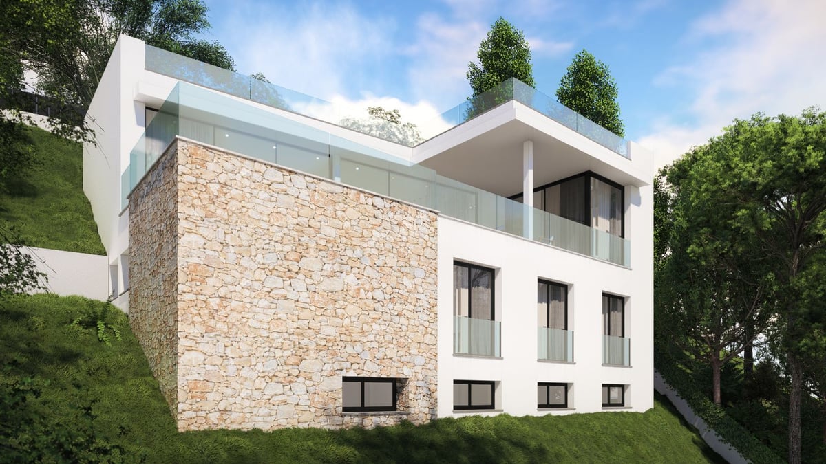 Villa blanche moderne sur une colline verdoyante avec mur en pierre naturelle et garde-corps en verre.