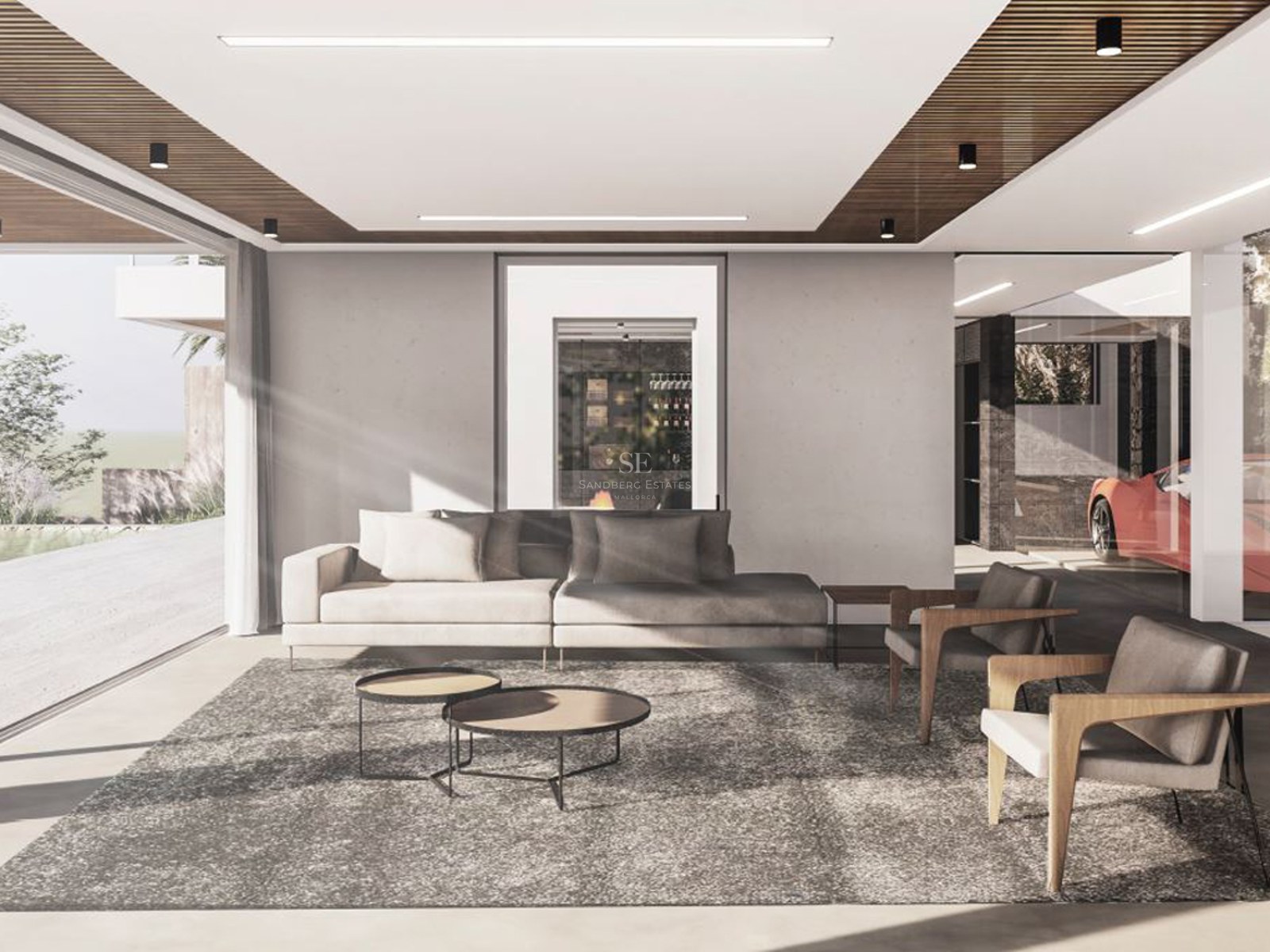 Minimalist living room with a grey sofa, wooden armchairs, and floor-to-ceiling windows showing a bright outdoor area.