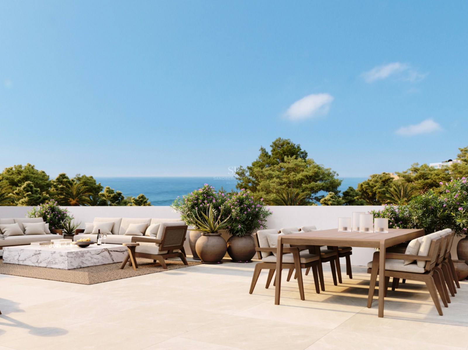 Spacious modern terrace with wood dining table, marble lounge area, and potted plants overlooking the ocean.
