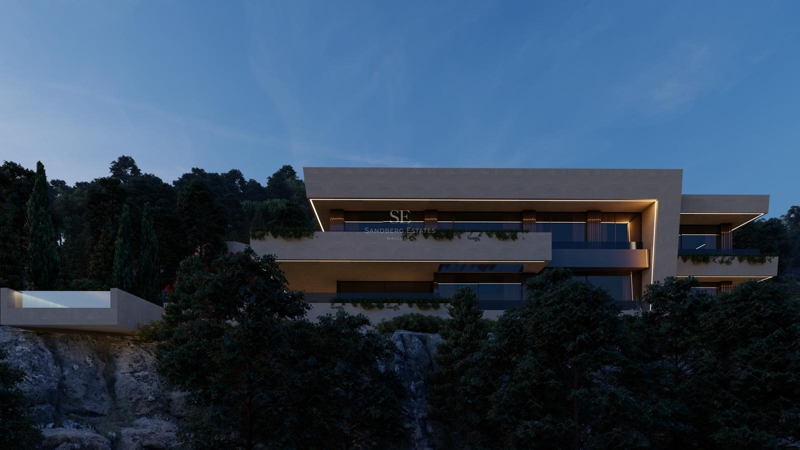 Modern flernivåvilla med LED-belysning i skymningen på en skogsklädd bergssluttning.
