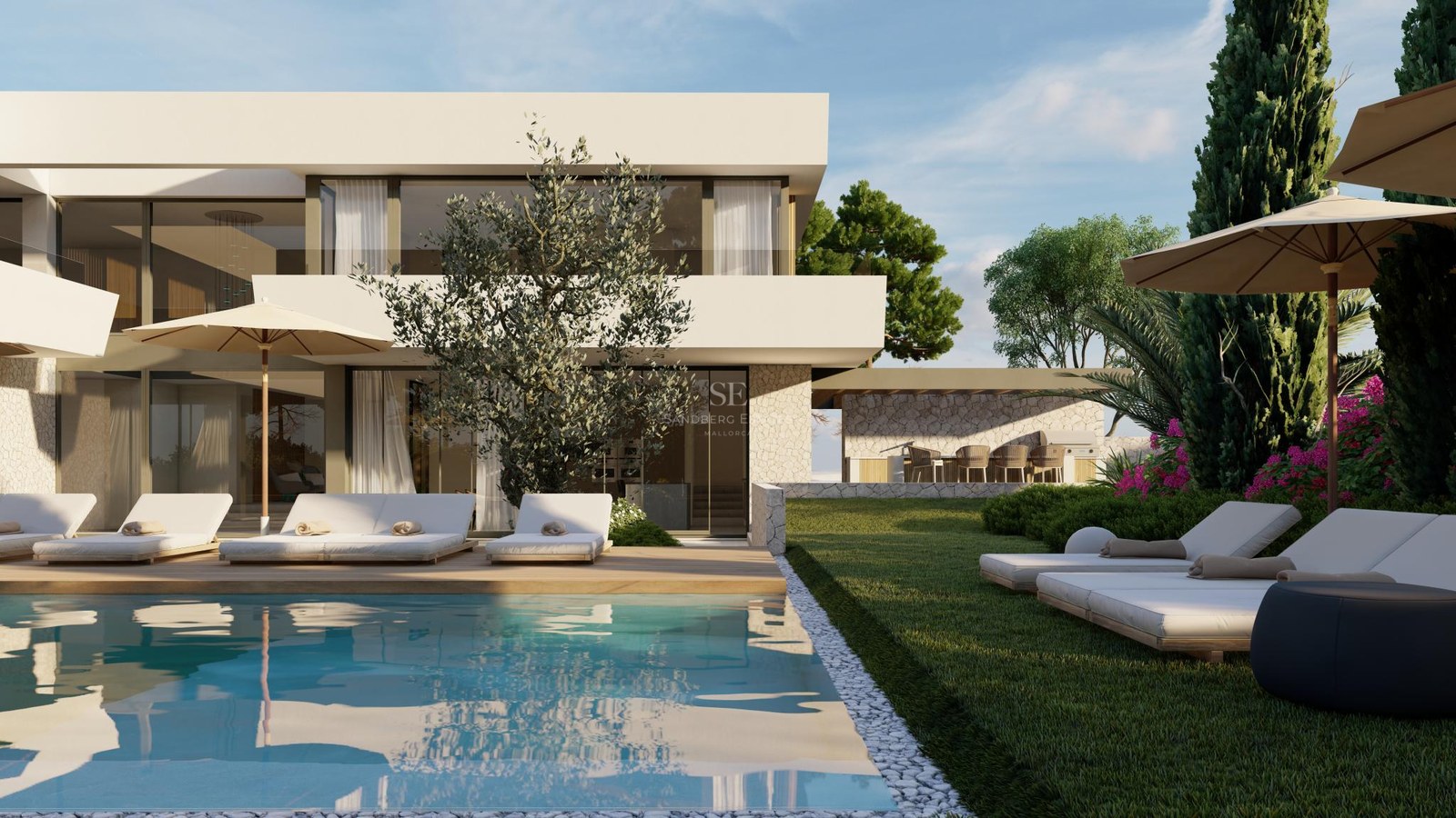 Modern two-story villa with large pool, sun loungers on a wooden deck, and manicured lawns under a clear blue sky.