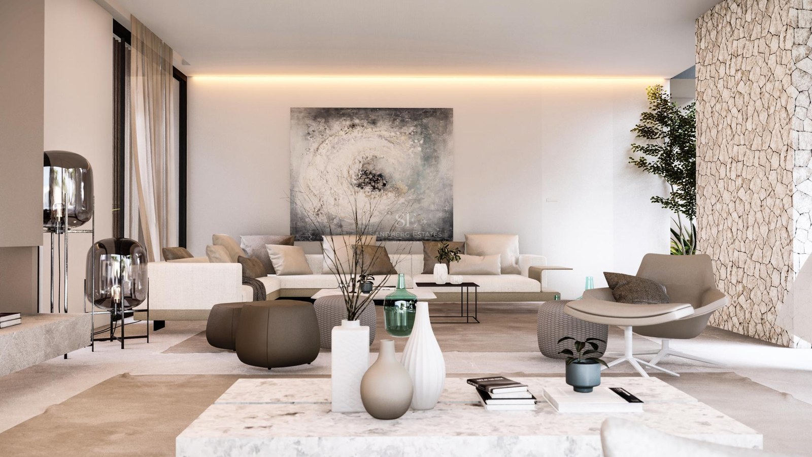 Spacious modern living room featuring a natural stone wall, large white L-shaped sofa, marble tables, and sheer curtains.