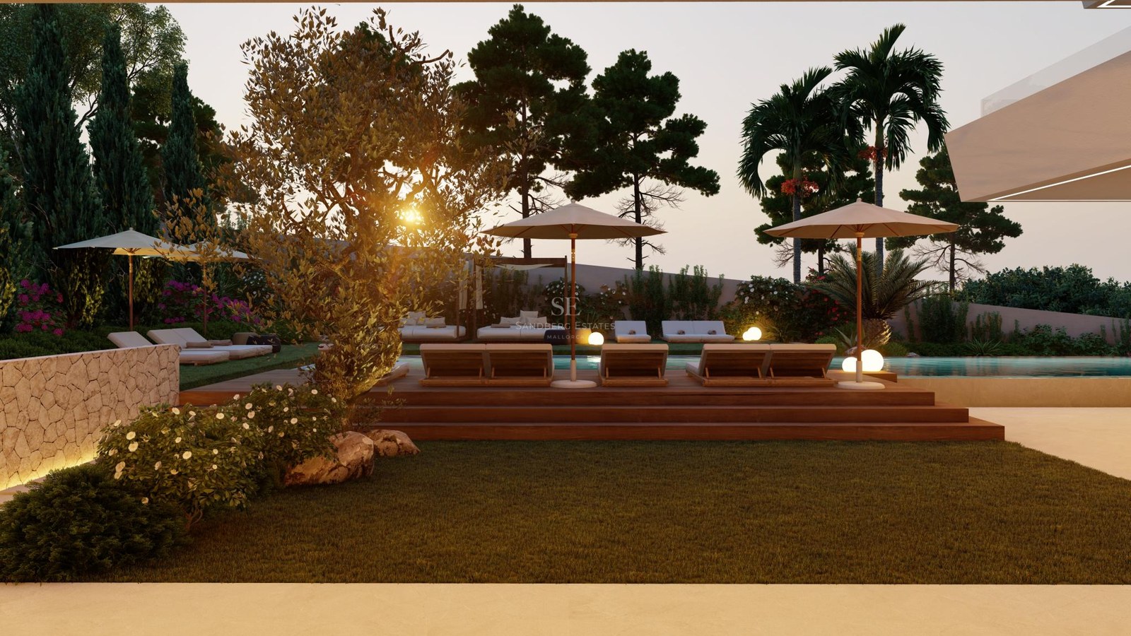 Luxury sun loungers on a wooden deck by an infinity pool at sunset, surrounded by lush gardens and palm trees.