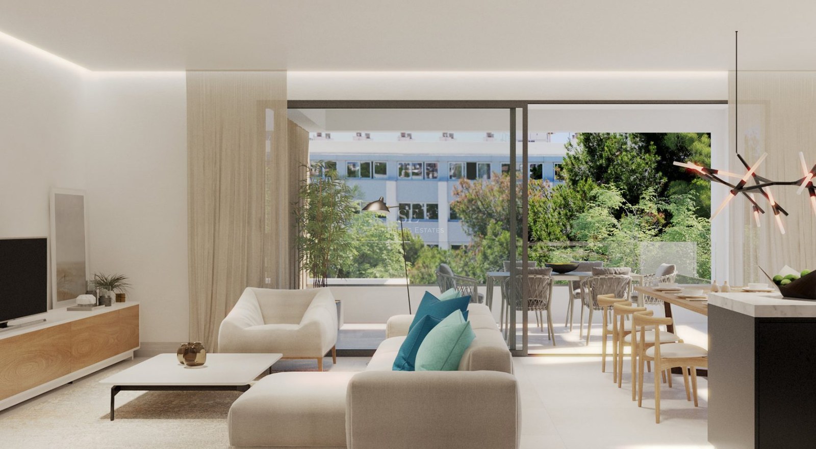 Bright living room with cream sofas, turquoise pillows, and large glass doors opening to a lush terrace.