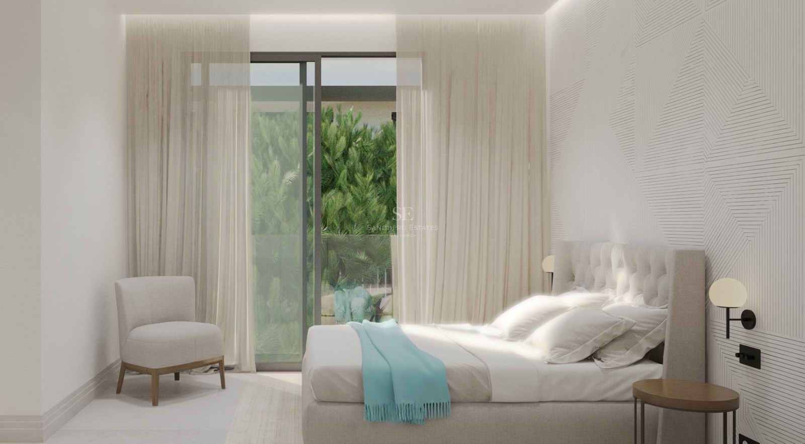 Modern bedroom with a tufted headboard, turquoise throw, armchair, and large windows looking onto lush green plants.
