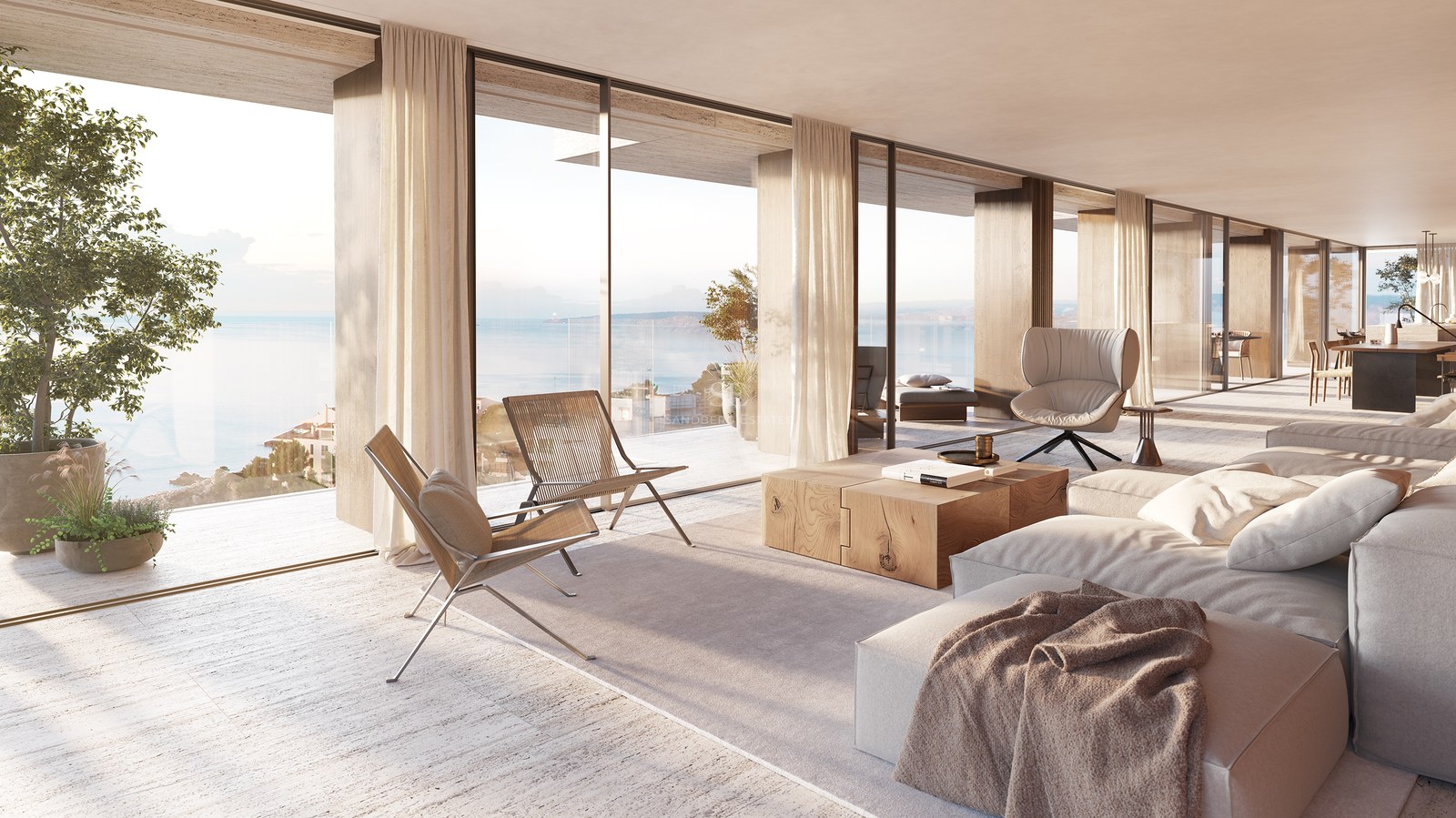 Bright minimalist living room with floor-to-ceiling windows overlooking the ocean, featuring a large sofa and wood table.