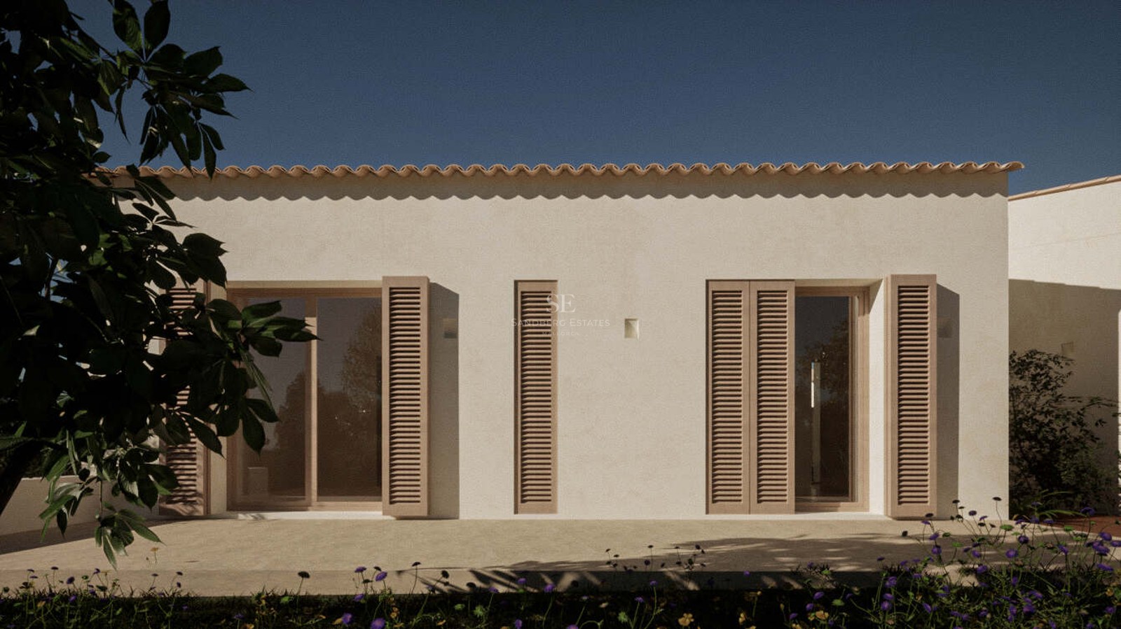 Cream-colored villa exterior featuring wooden Mallorquina shutters and terracotta roof tiles under a clear blue sky.