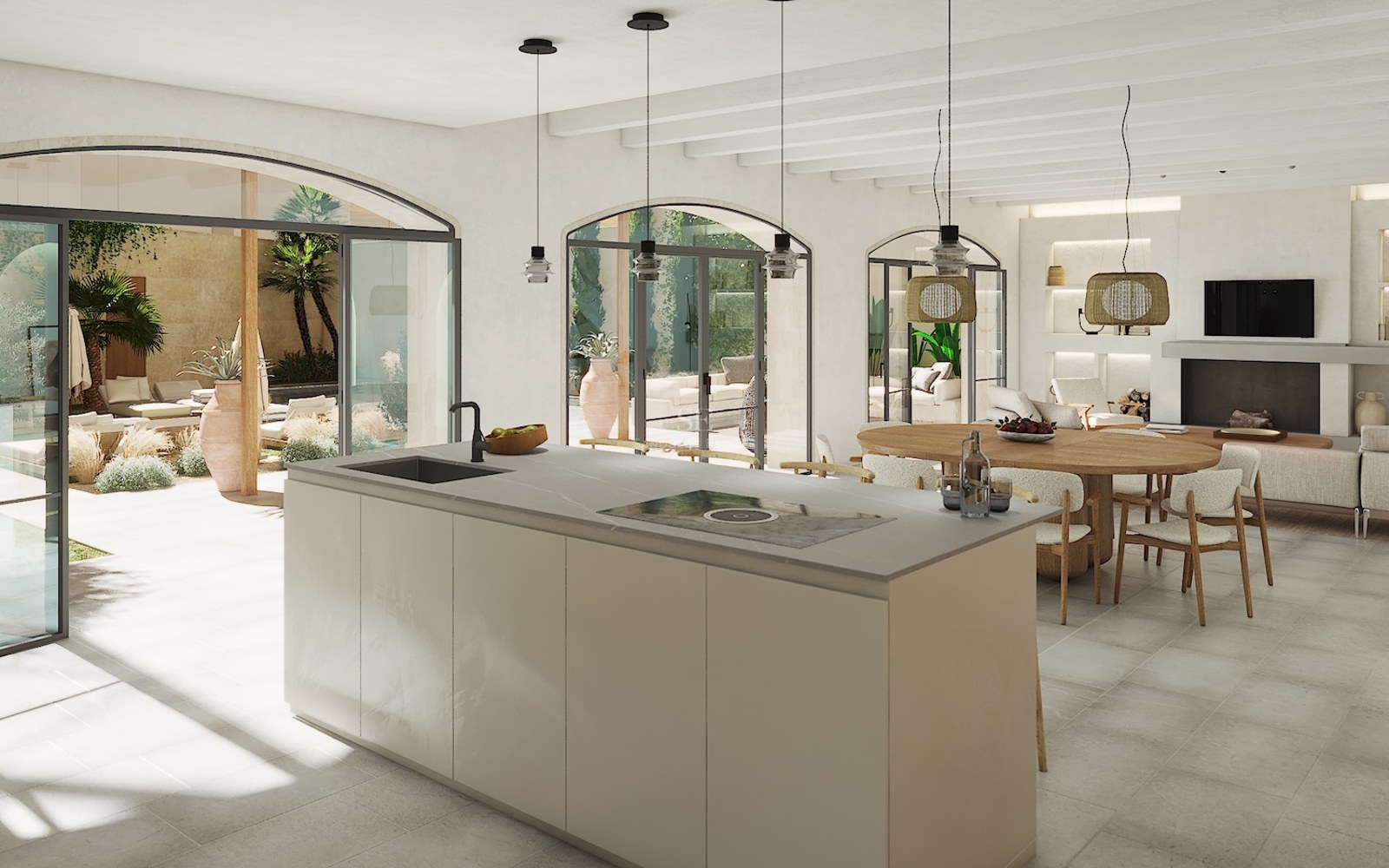 Luxury kitchen island overlooking a dining area and Mediterranean patio through arched glass doors and beamed ceilings.
