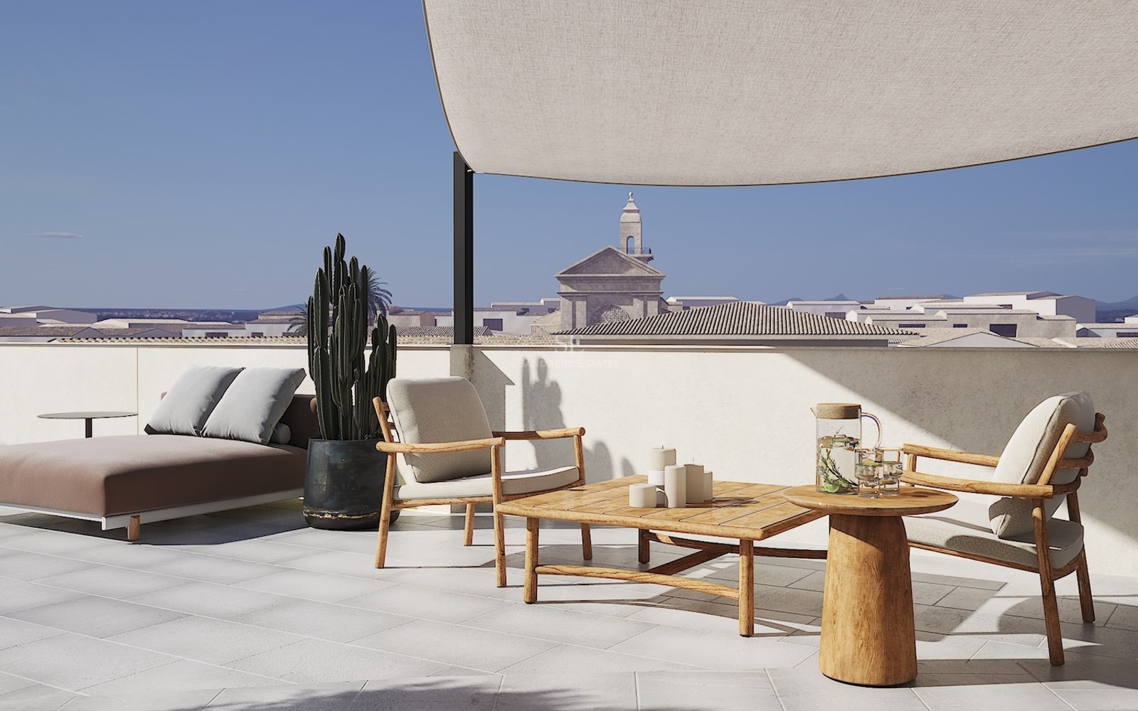 Modern rooftop terrace with teak lounge chairs, a daybed, and a sail shade, overlooking a historic church tower.