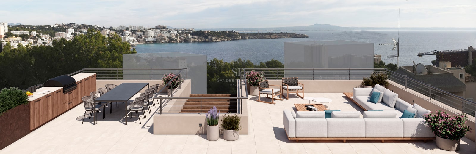 Vaste toit-terrasse avec cuisine d'été, coin repas et salon offrant une vue imprenable sur la mer.