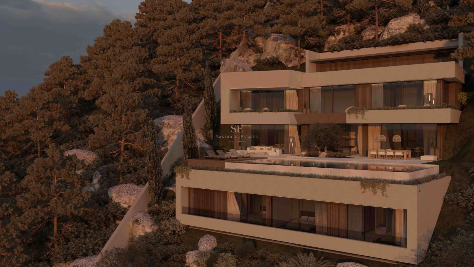 Villa moderna de varios niveles integrada en una ladera rocosa con piscina infinita y amplios ventanales al atardecer.