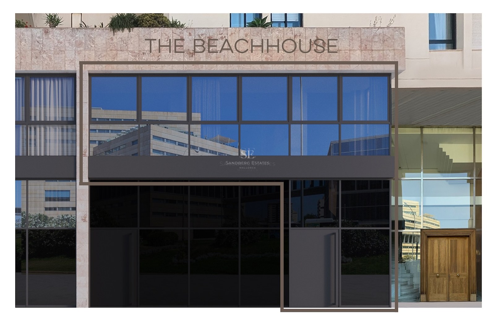 Contemporary building facade with large glass panels and natural stone cladding featuring 'THE BEACHHOUSE' signage.