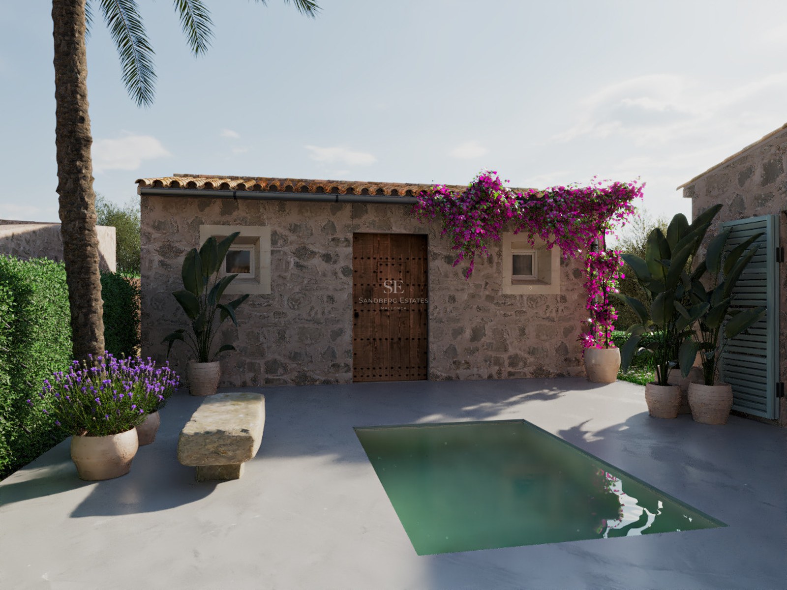 Privater Pool umgeben von Lavendel und Bougainvillea in einem rustikalen mediterranen Steinhof.