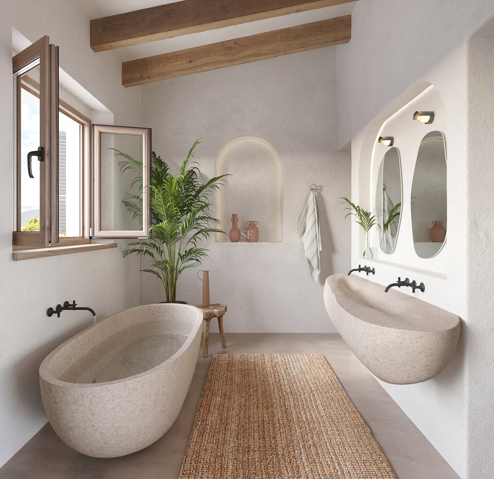 Baignoire et lavabo en pierre sculptée dans une salle de bain avec poutres en bois et murs en plâtre.