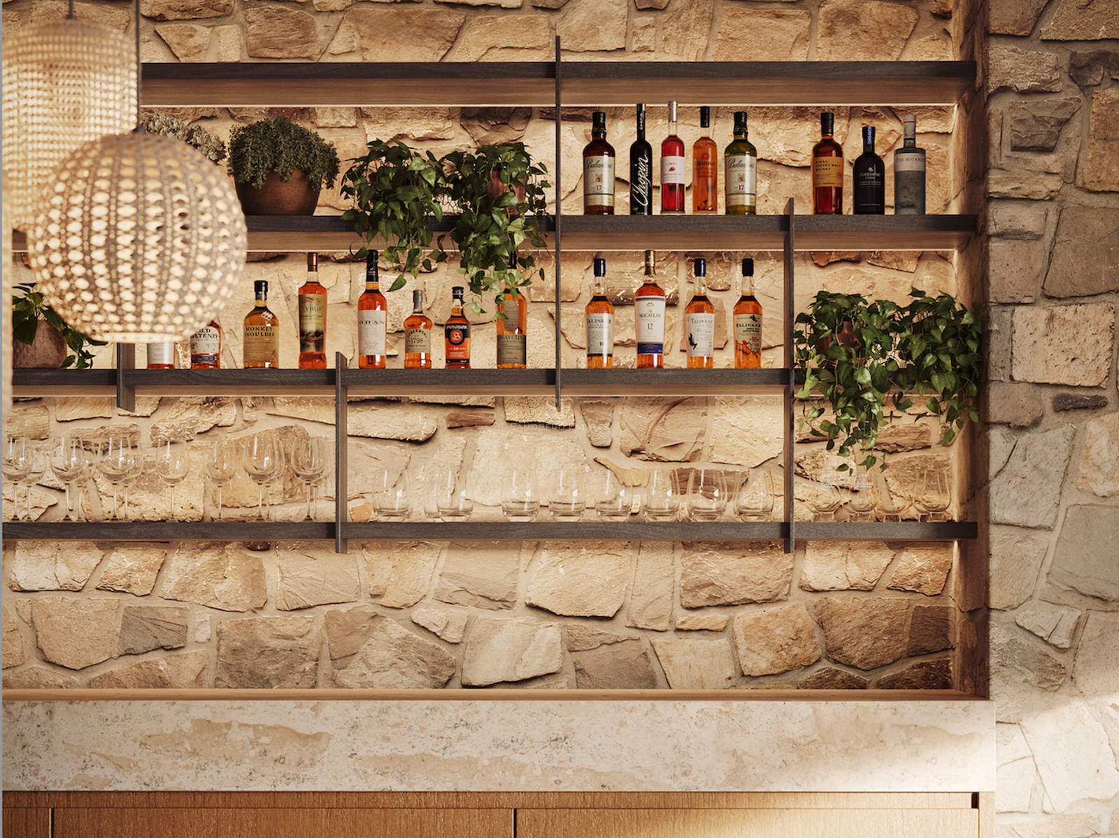 Espace bar avec mur en pierre, étagères en bois avec bouteilles d'alcool, verres et suspensions en fibres naturelles.