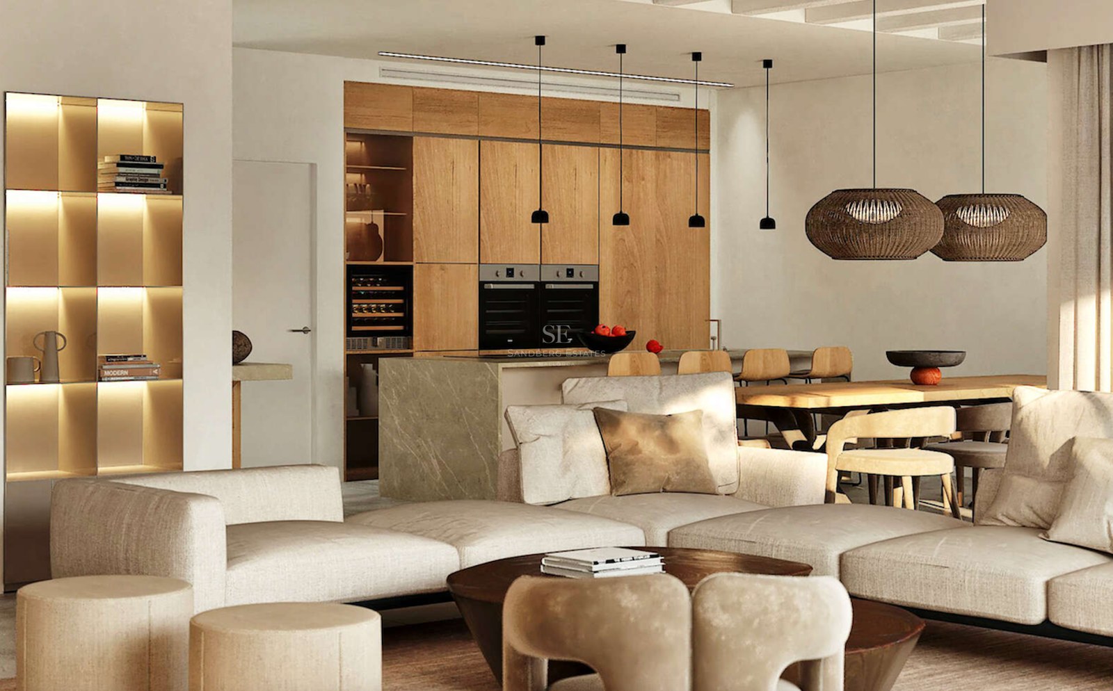 Salon contemporain avec canapé crème, îlot en marbre et menuiserie en bois sous un éclairage chaleureux.