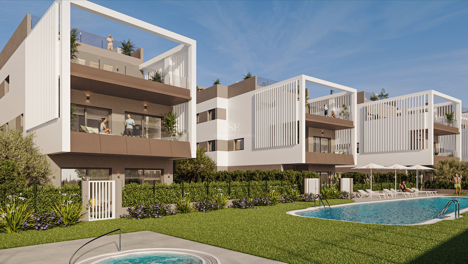 Modern white apartment complex featuring a large swimming pool, green lawn, and expansive terraces under a clear blue sky.