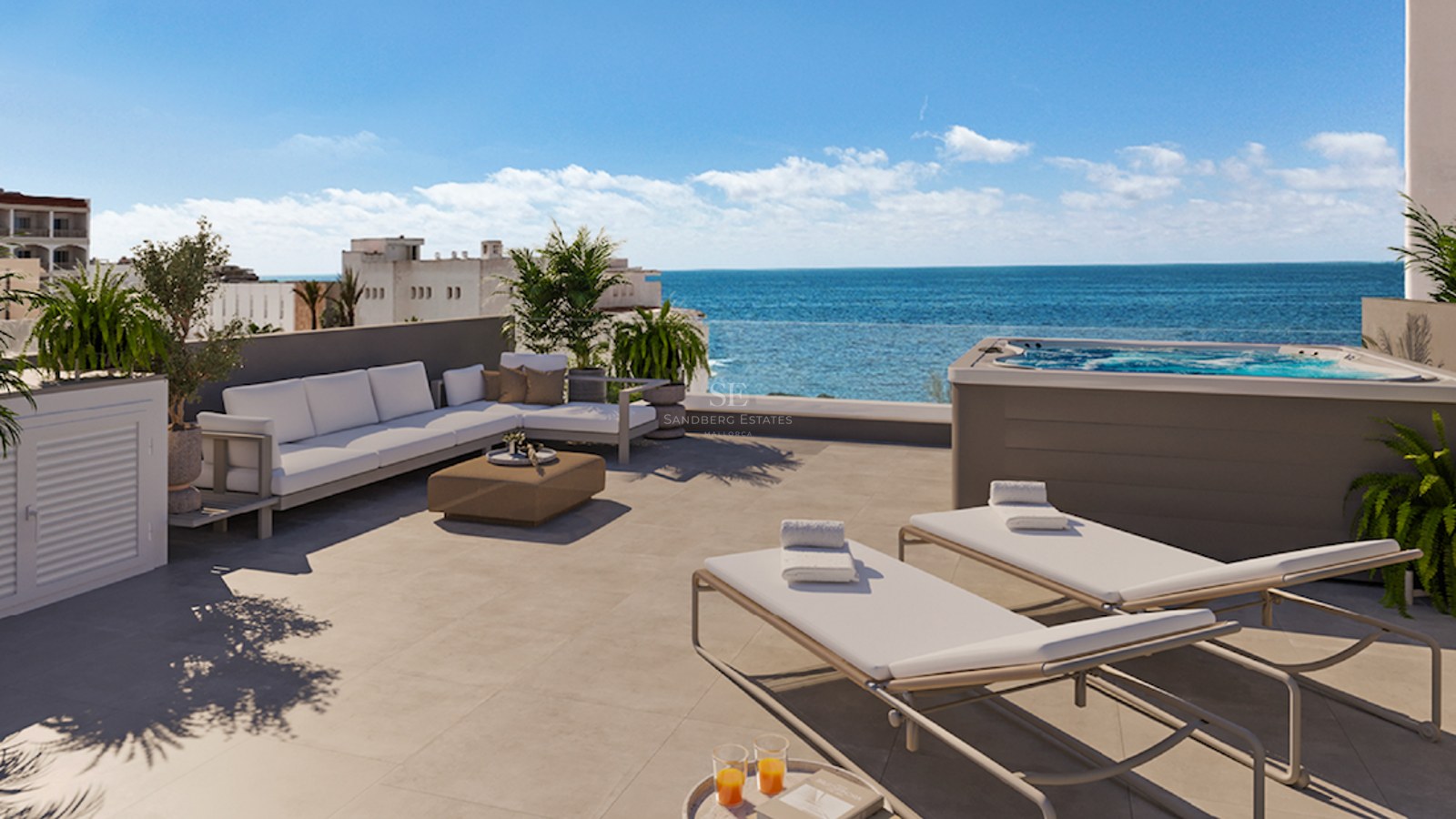 Modern rooftop terrace featuring a private hot tub, white lounge furniture, and sunbeds overlooking the Mediterranean sea.